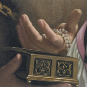 Canvas texture macro of the pearls and gold casket